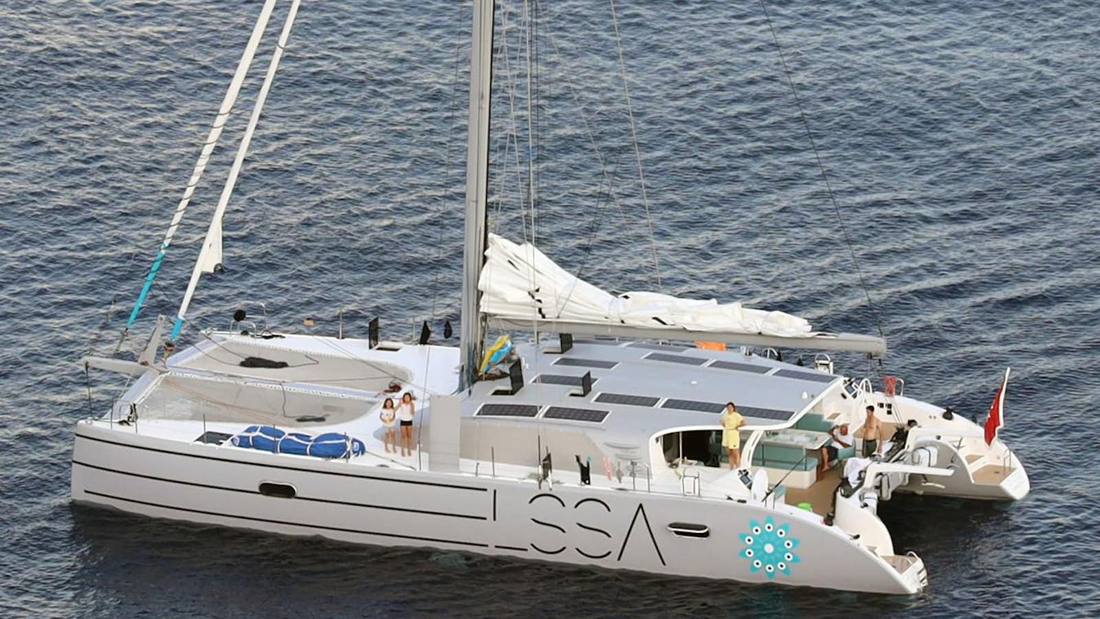 a white boat with people on it aboard ELSSA Yacht for Sale