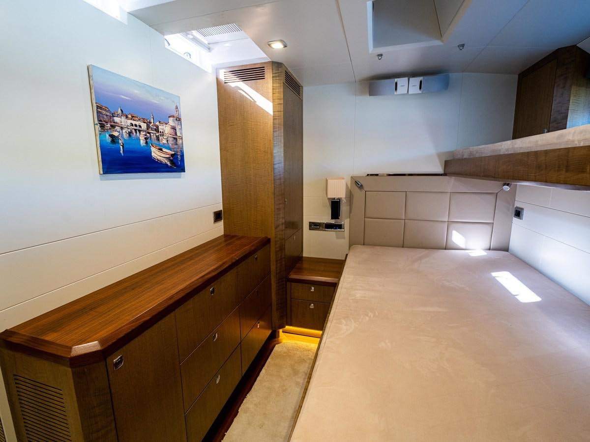 a room with wooden cabinets aboard BELKARA Yacht for Sale