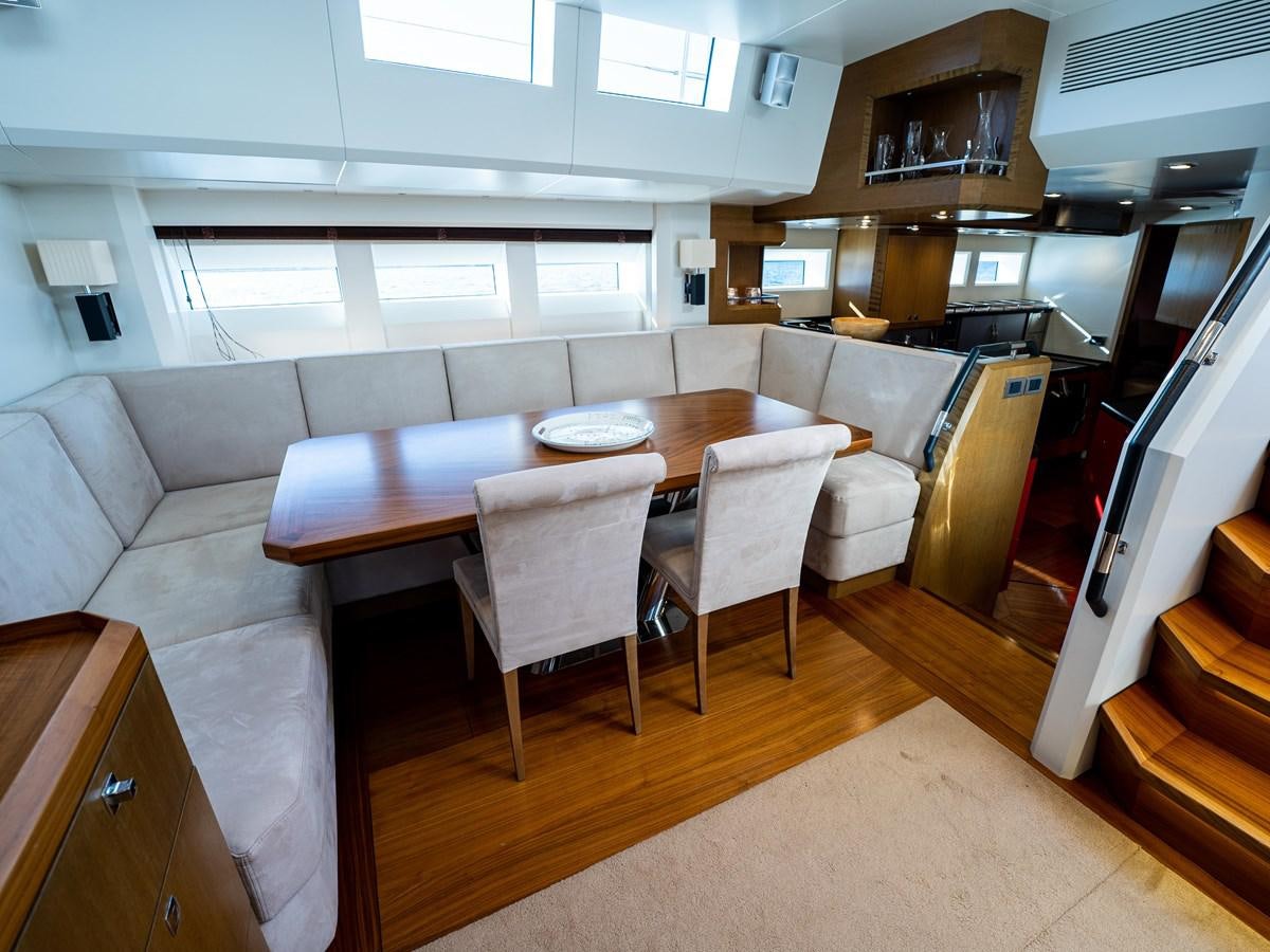 a kitchen and dining area aboard BELKARA Yacht for Sale