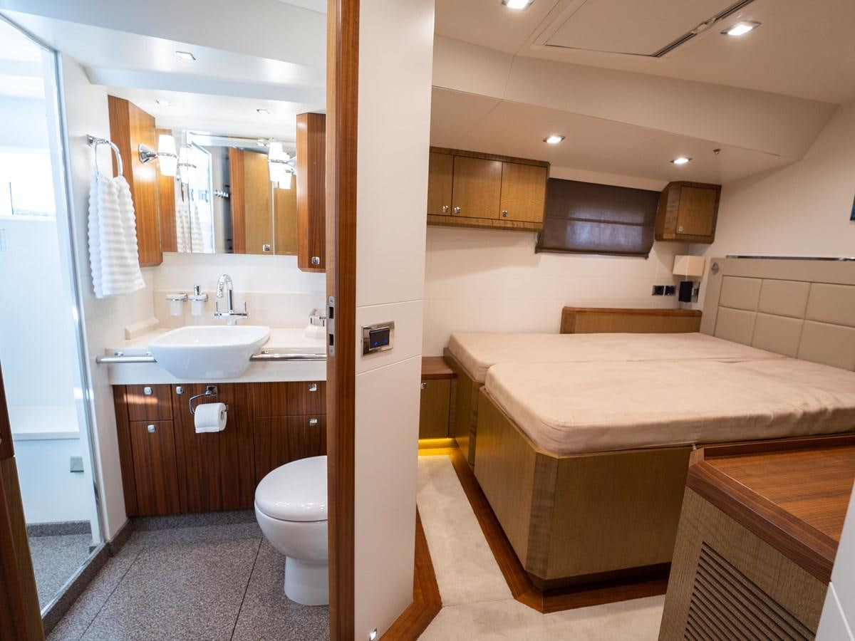a bathroom with a tub sink and toilet aboard BELKARA Yacht for Sale