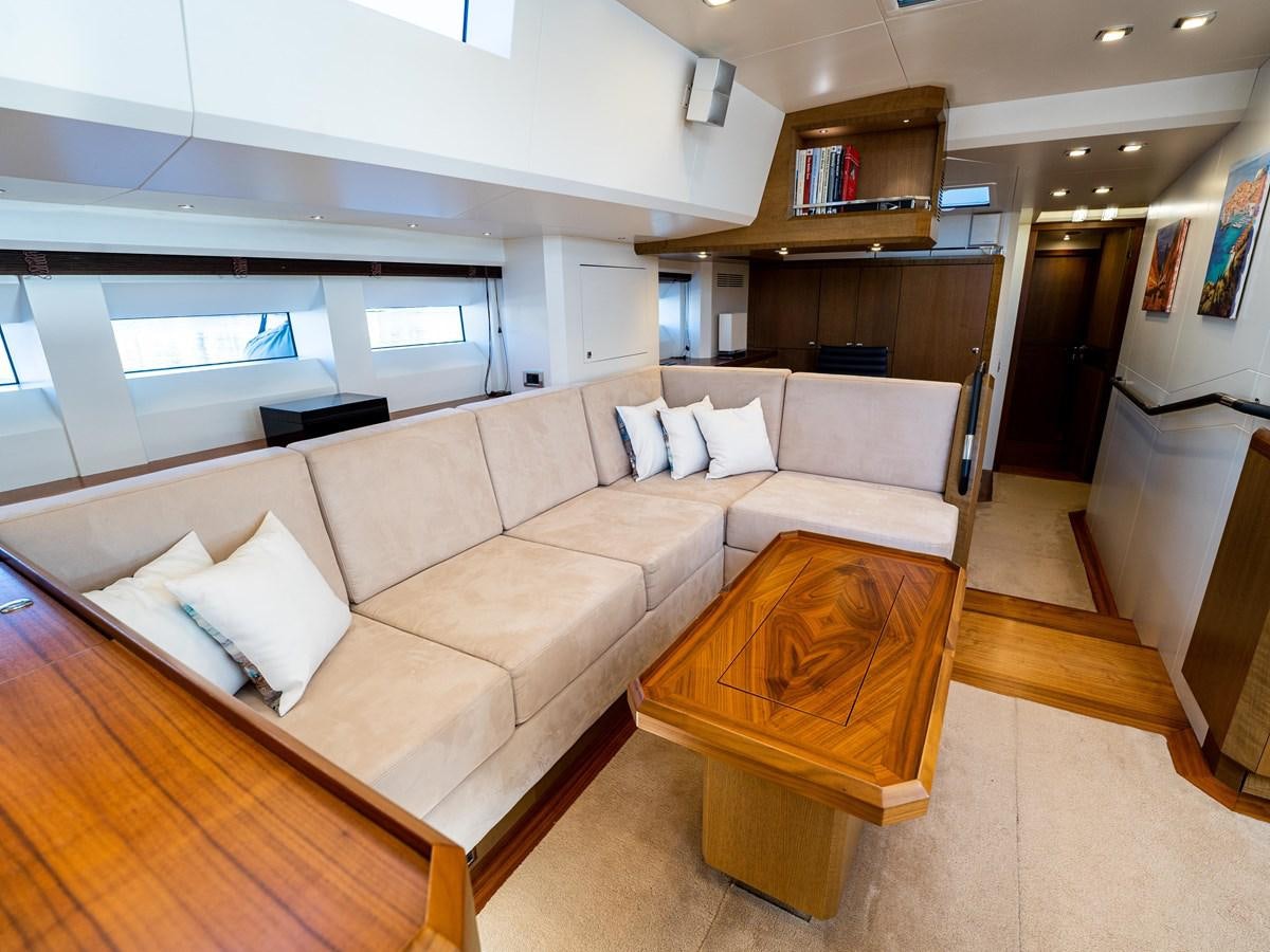 a living room with a couch aboard BELKARA Yacht for Sale