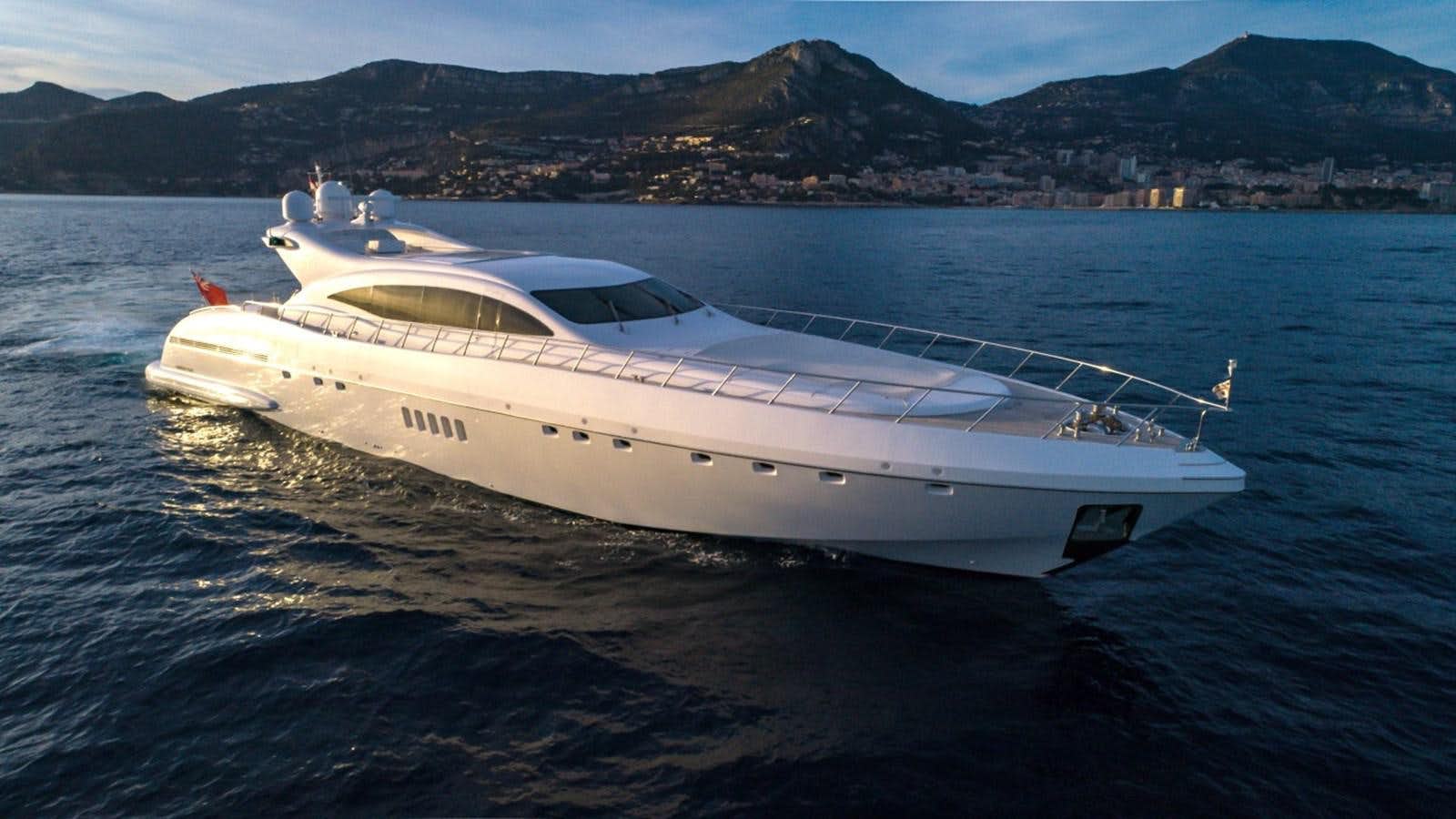 a white yacht on the water aboard KING Yacht for Sale