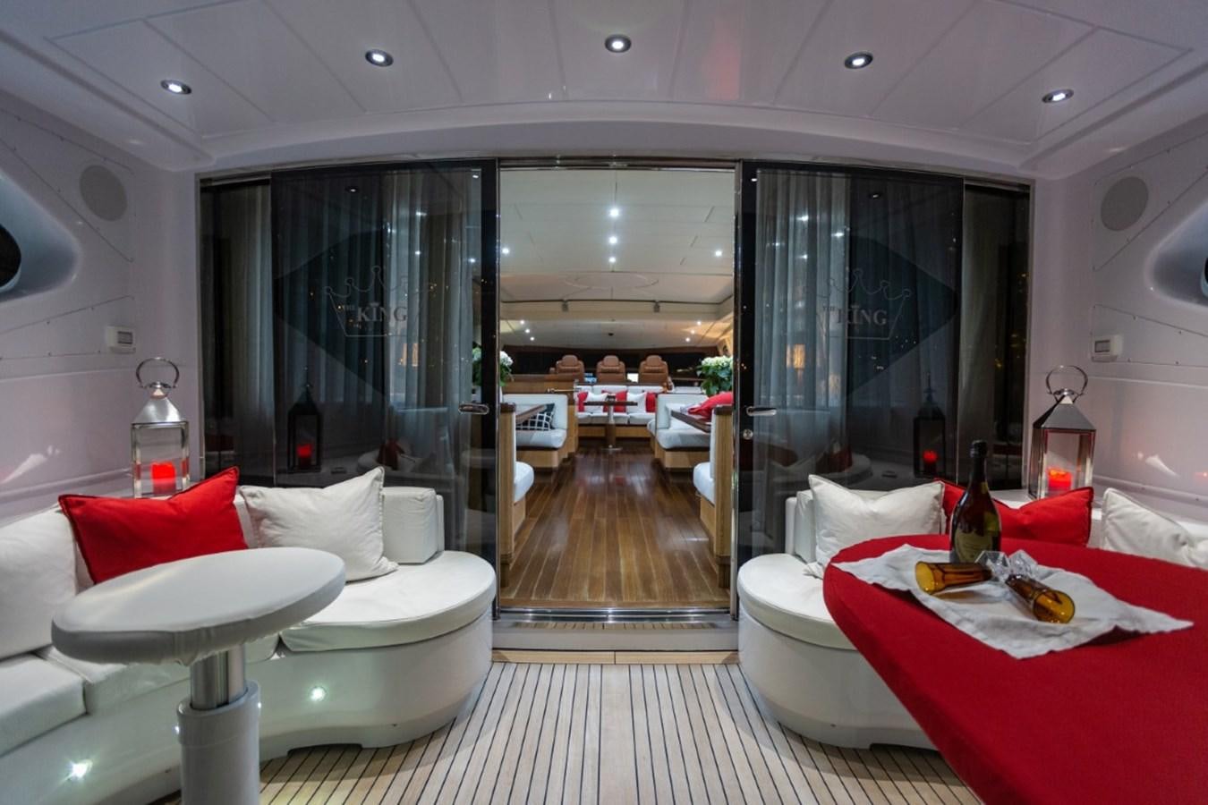 a room with a table and chairs aboard BELISA Yacht for Sale