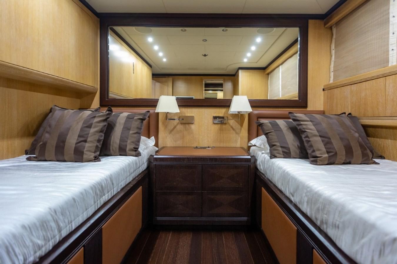 a room with two beds aboard BELISA Yacht for Sale