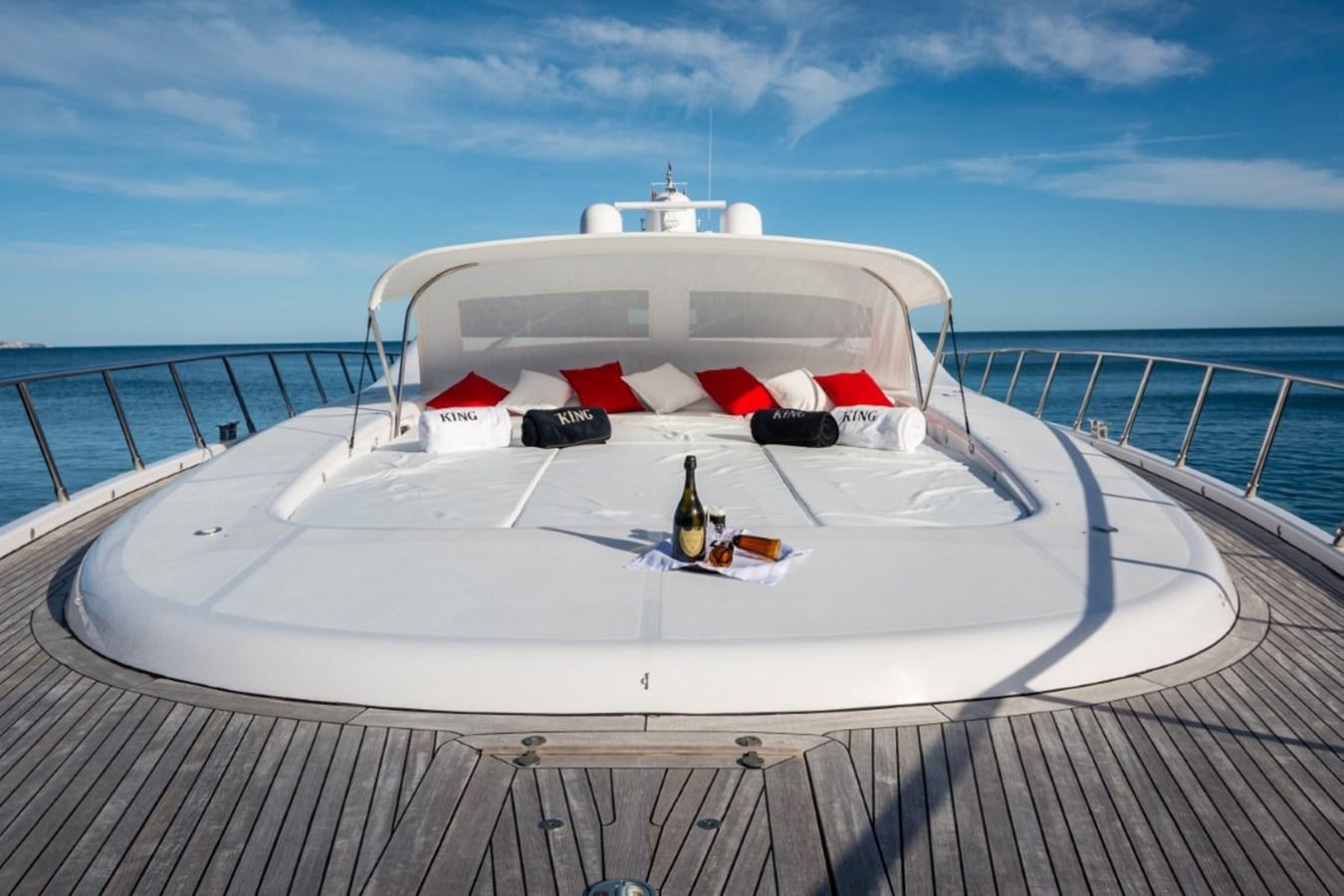 a white boat on a deck aboard BELISA Yacht for Sale
