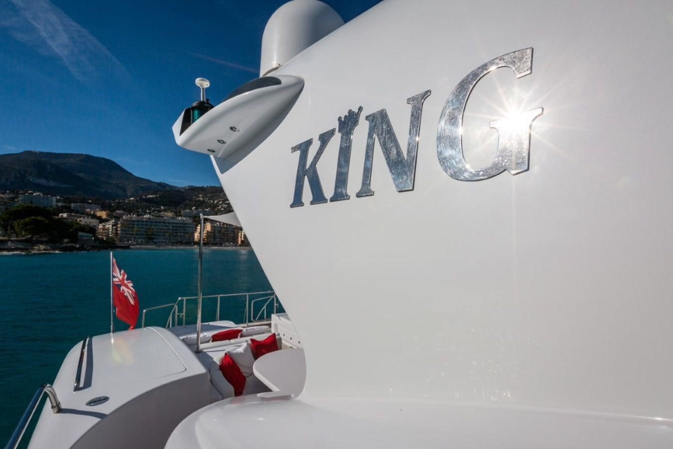 a boat with a flag on the front aboard BELISA Yacht for Sale