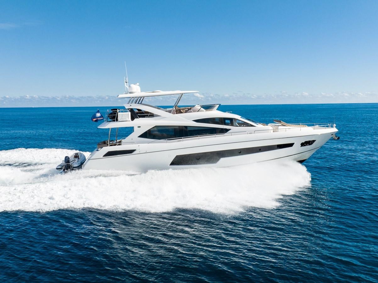 a white yacht on the water aboard GOLDEN OURS Yacht for Sale