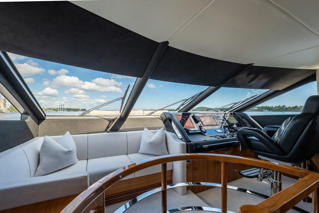 a boat with a large body of water in the background aboard GOLDEN OURS Yacht for Sale