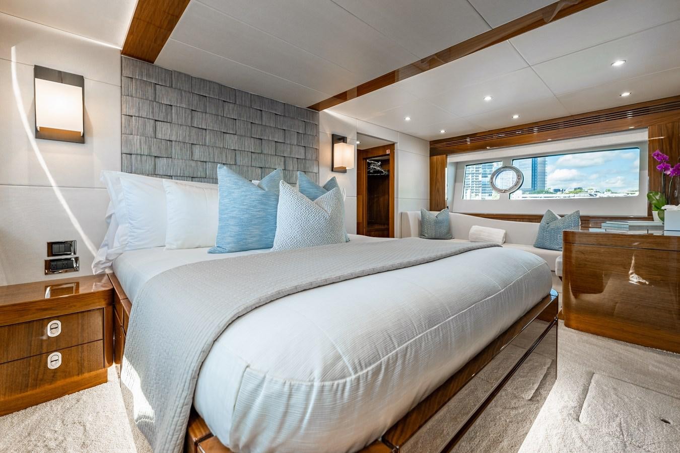 a large bed in a room aboard GOLDEN OURS Yacht for Sale