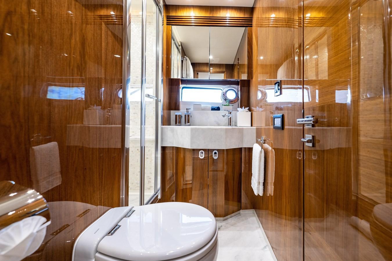 a bathroom with a sink and a shower aboard GOLDEN OURS Yacht for Sale