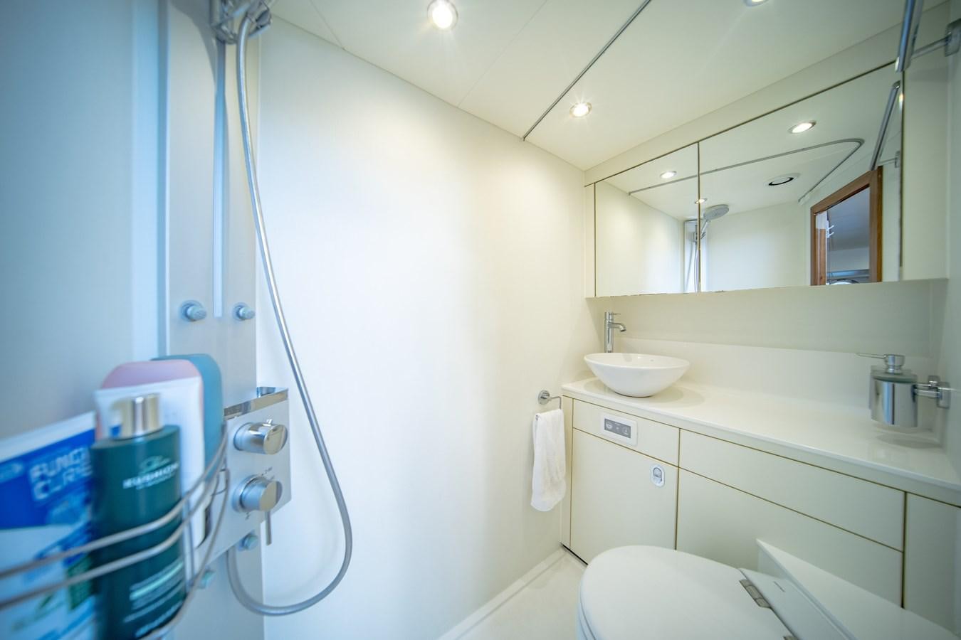 a bathroom with a sink and a toilet aboard GOLDEN OURS Yacht for Sale