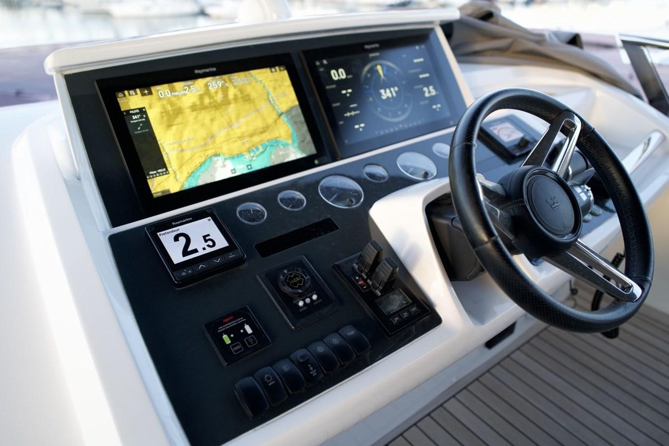a car stereo with a screen aboard PRINCESS S65 Yacht for Sale