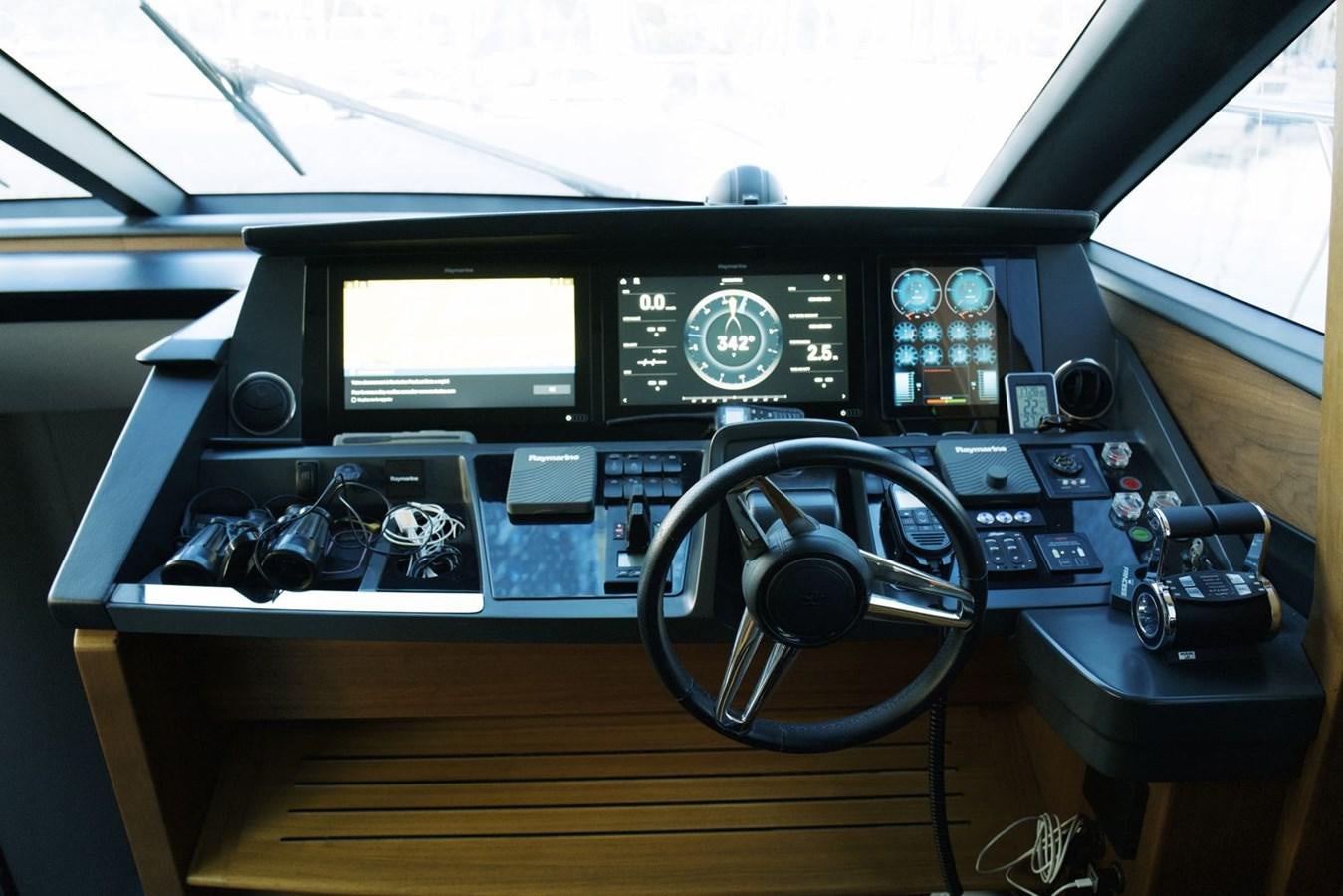 a control panel with a screen and buttons aboard PRINCESS S65 Yacht for Sale