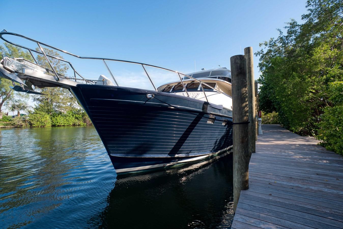a boat on a dock aboard BLUE ROSY V Yacht for Sale