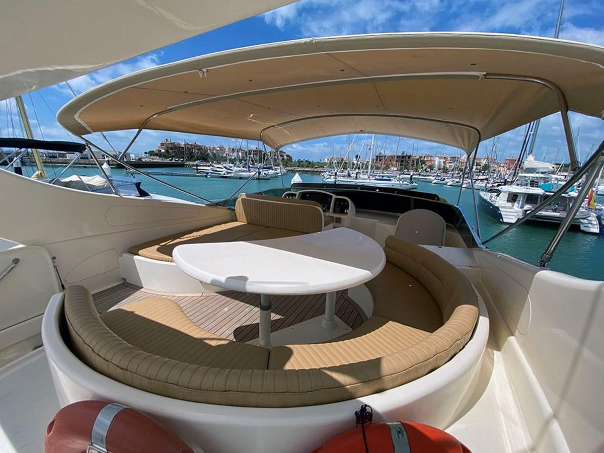 a lounge chair on a boat aboard SPEED 5 Yacht for Sale