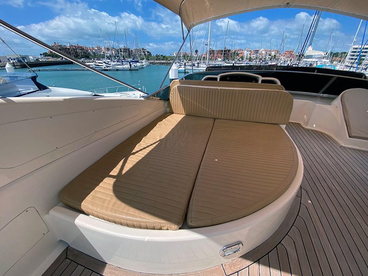a room with a view of a city and water aboard SPEED 5 Yacht for Sale