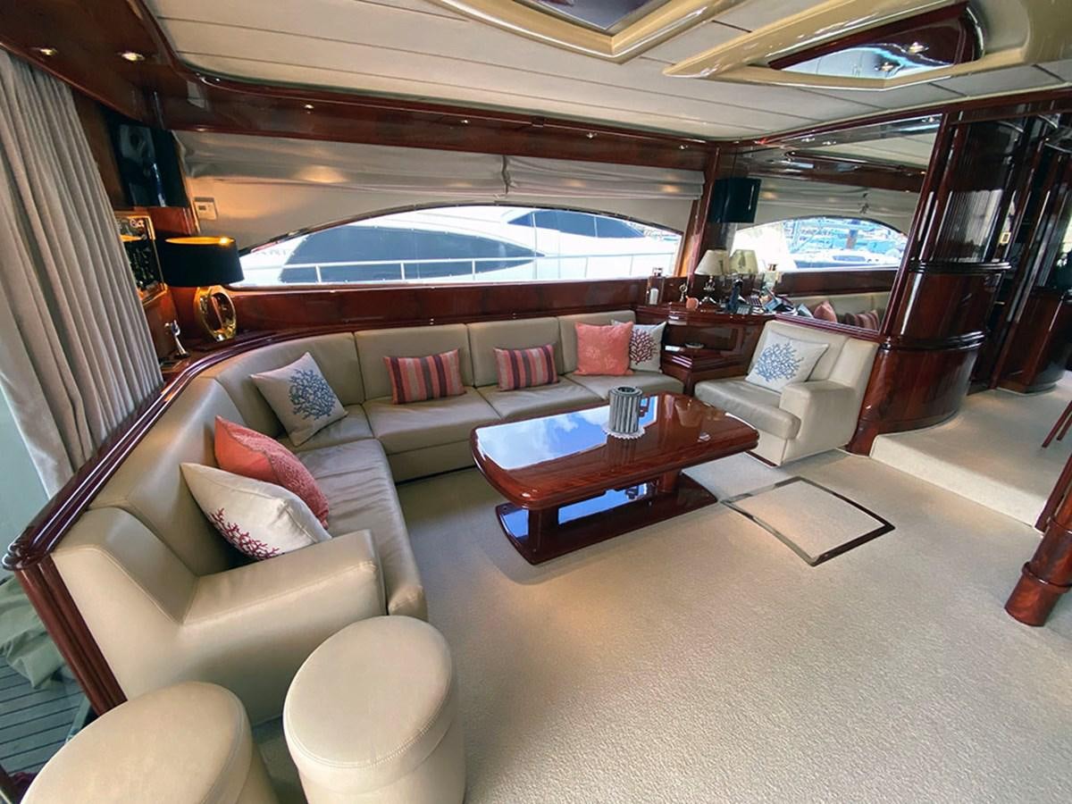 a living room with a large window aboard SPEED 5 Yacht for Sale