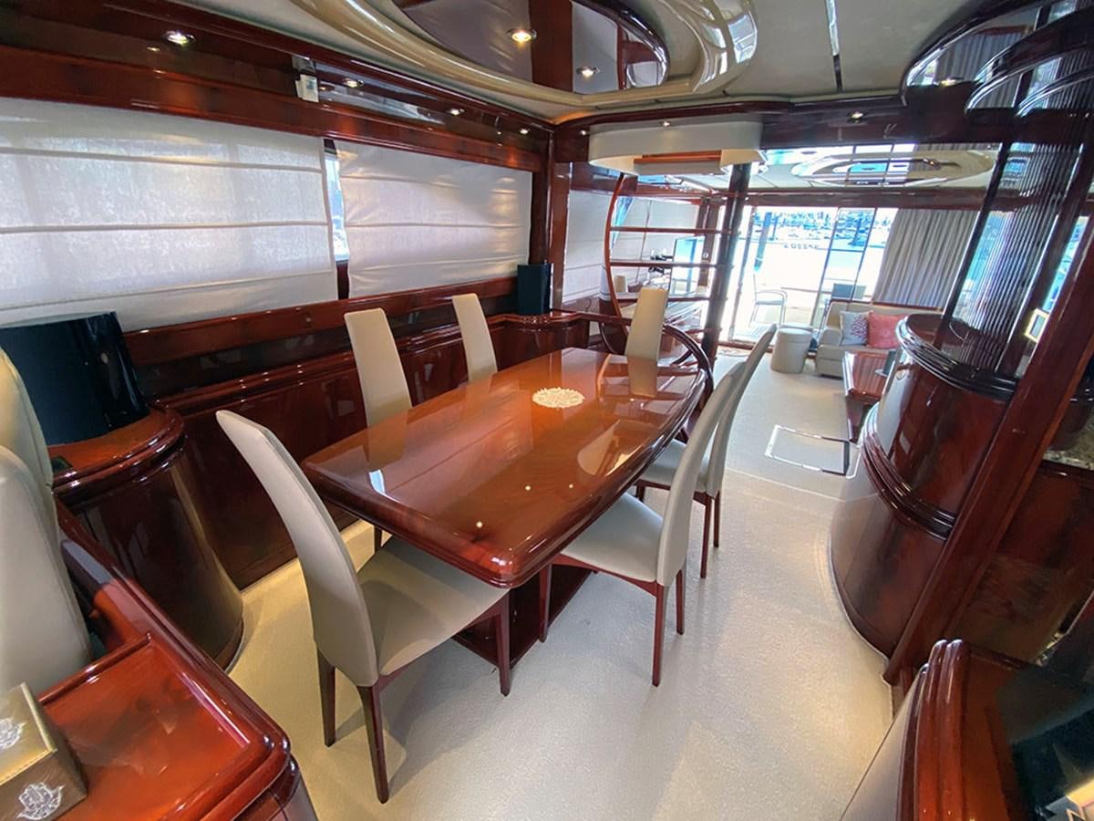 a restaurant with tables and chairs aboard SPEED 5 Yacht for Sale