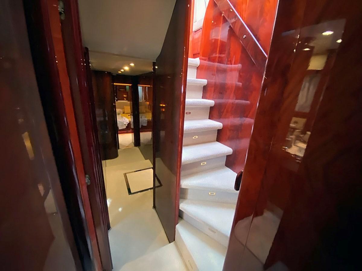 a hallway with red walls aboard SPEED 5 Yacht for Sale