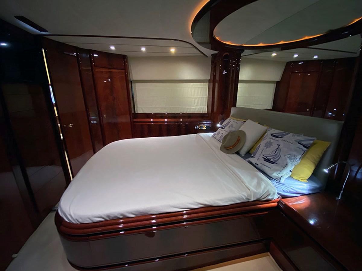 a couple of beds sit near each other aboard SPEED 5 Yacht for Sale