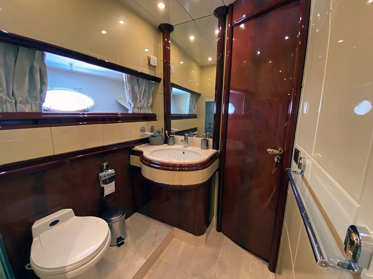 a bathroom with a sink and toilet aboard SPEED 5 Yacht for Sale