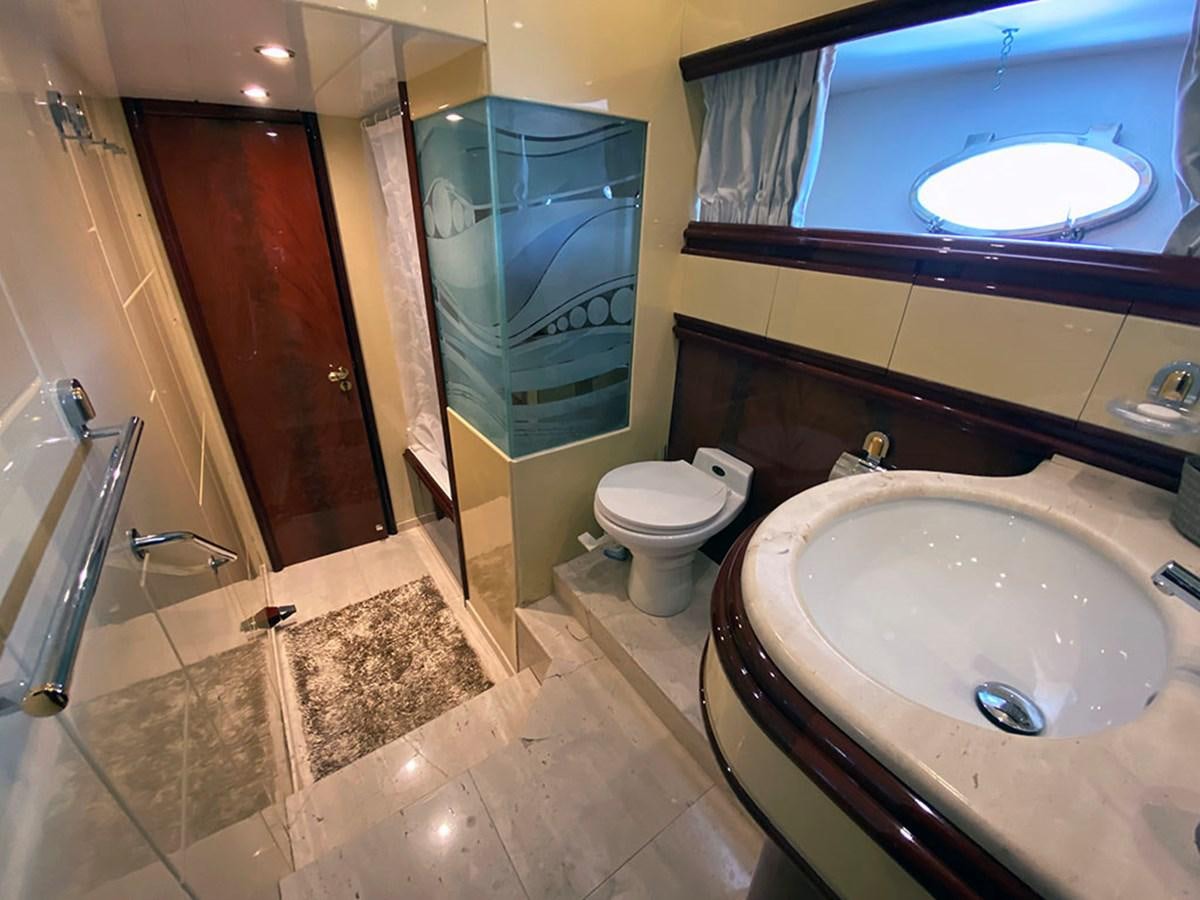 a bathroom with a sink and toilet aboard SPEED 5 Yacht for Sale