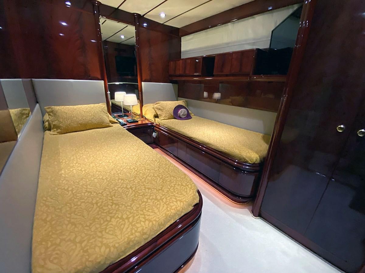 a room with two beds aboard SPEED 5 Yacht for Sale