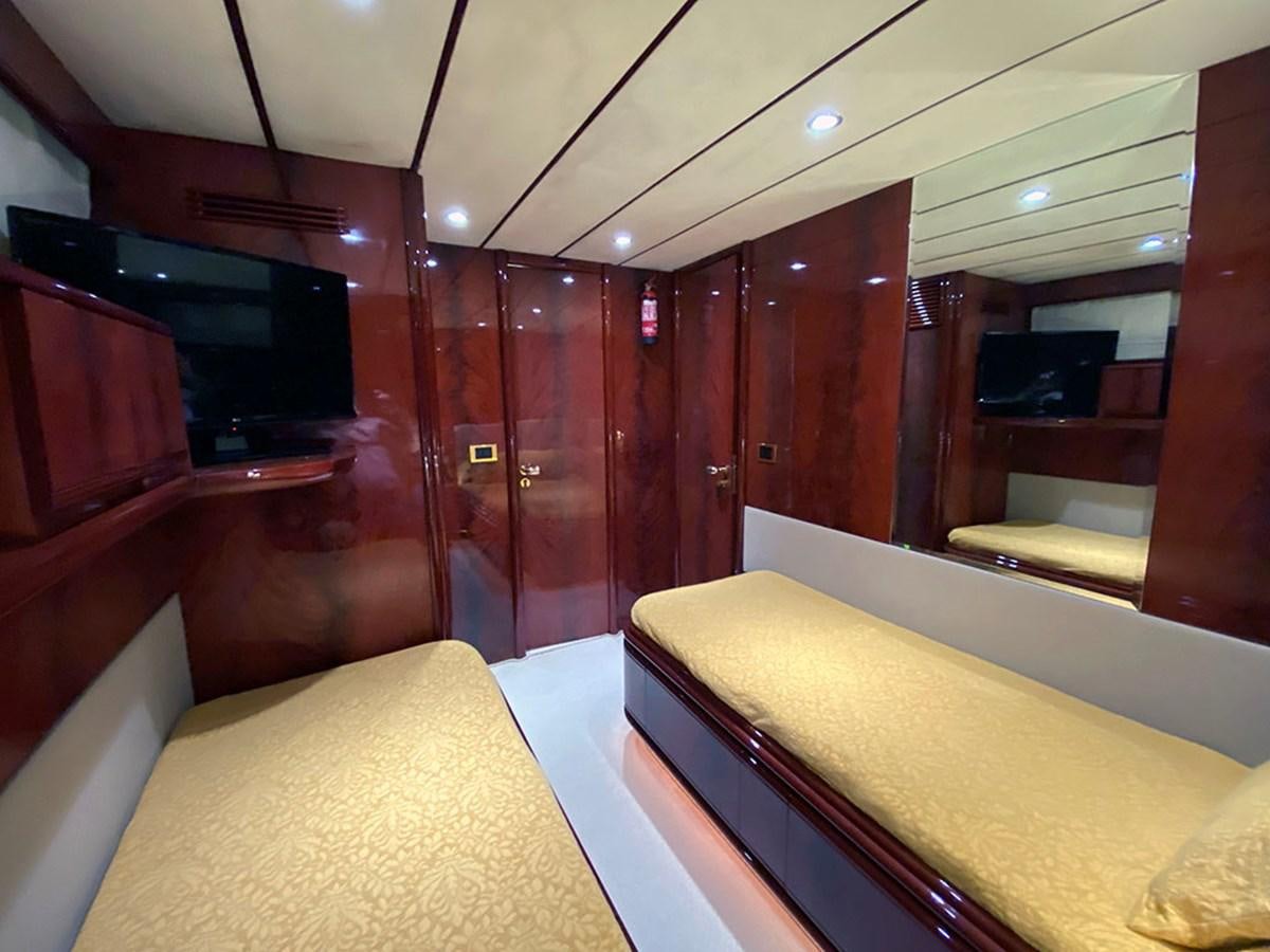 a room with a bed and a mirror aboard SPEED 5 Yacht for Sale