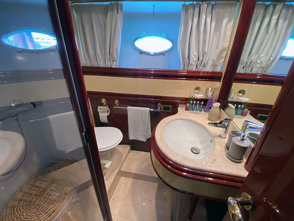 a bathroom with a sink and a bathtub aboard SPEED 5 Yacht for Sale