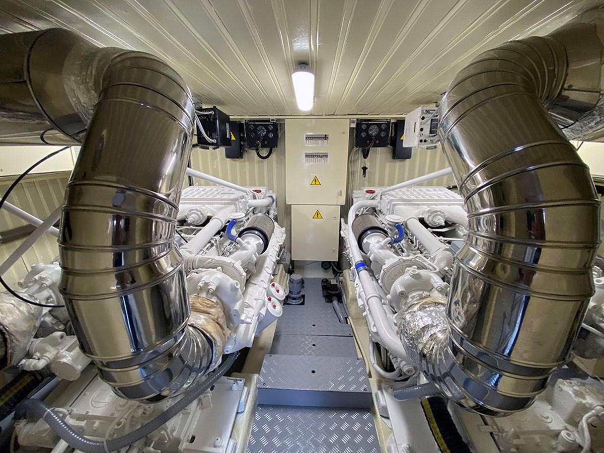 a large machine in a room aboard SPEED 5 Yacht for Sale