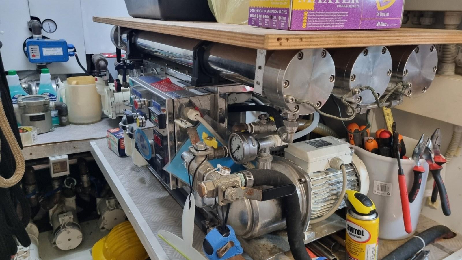 a machine with a large engine aboard GUSS 97 Yacht for Sale