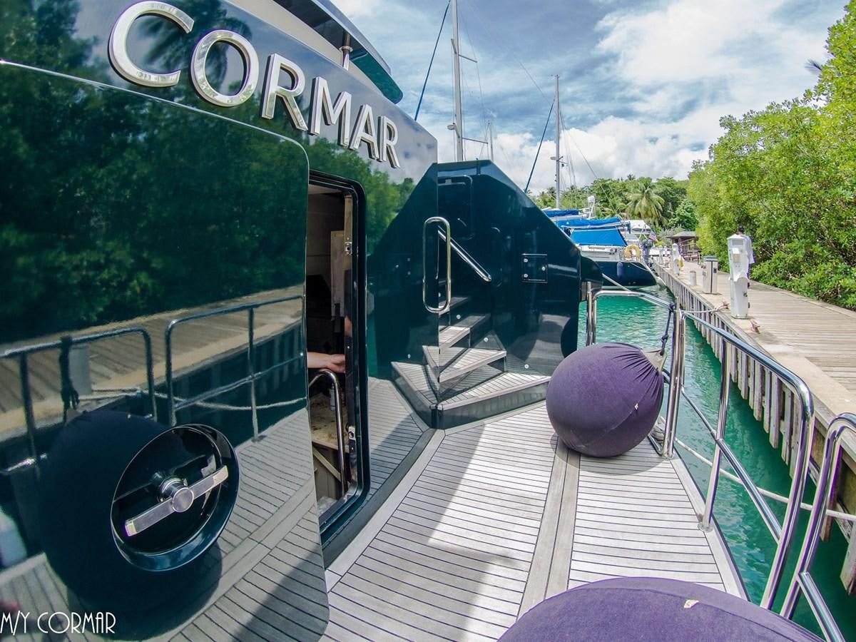 a boat on a body of water aboard cormar Yacht for Sale