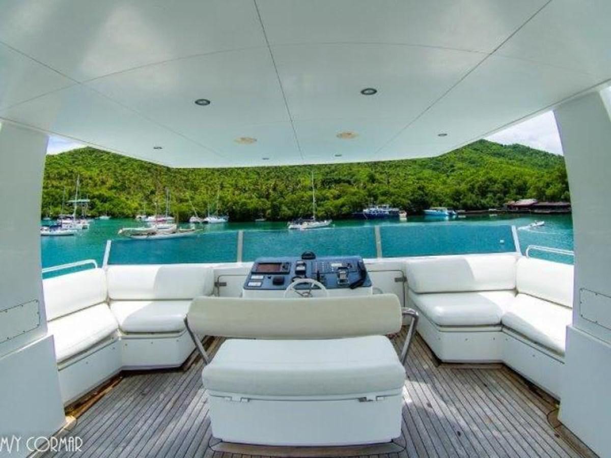 a room with a pool and a couch aboard cormar Yacht for Sale