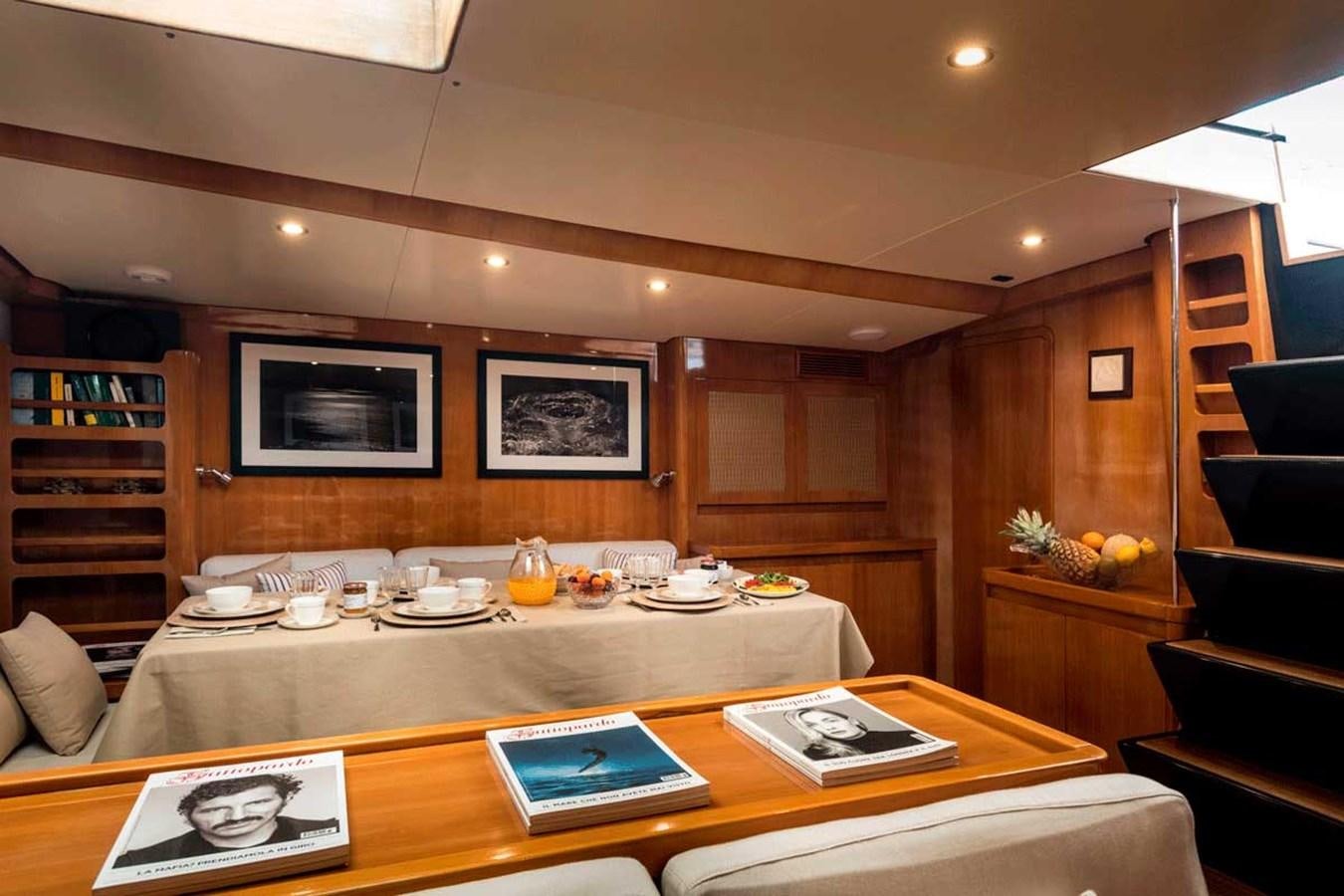 a large kitchen with a large island aboard LOGICA Yacht for Sale
