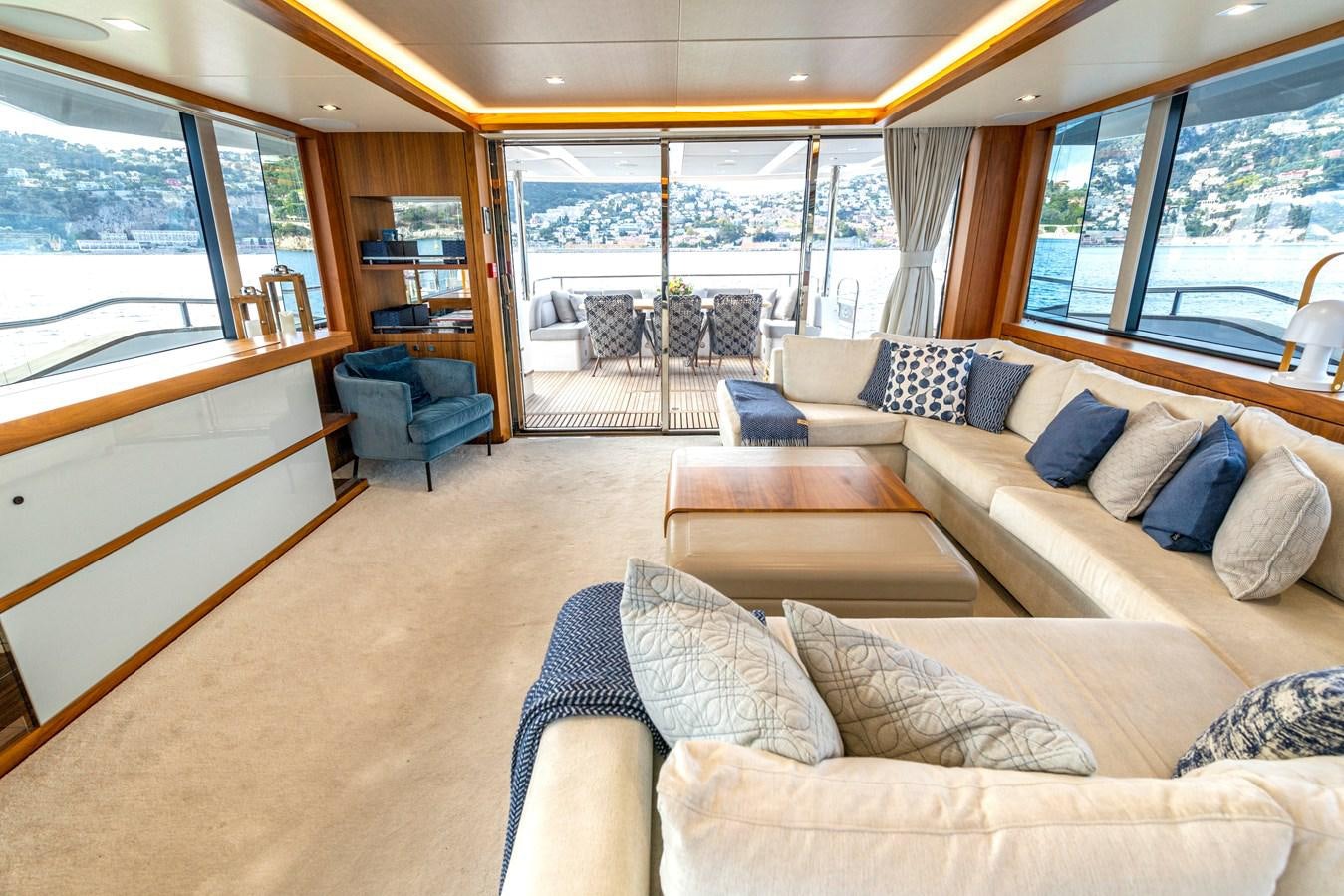 a living room with a large window aboard TAKE OFF Yacht for Sale