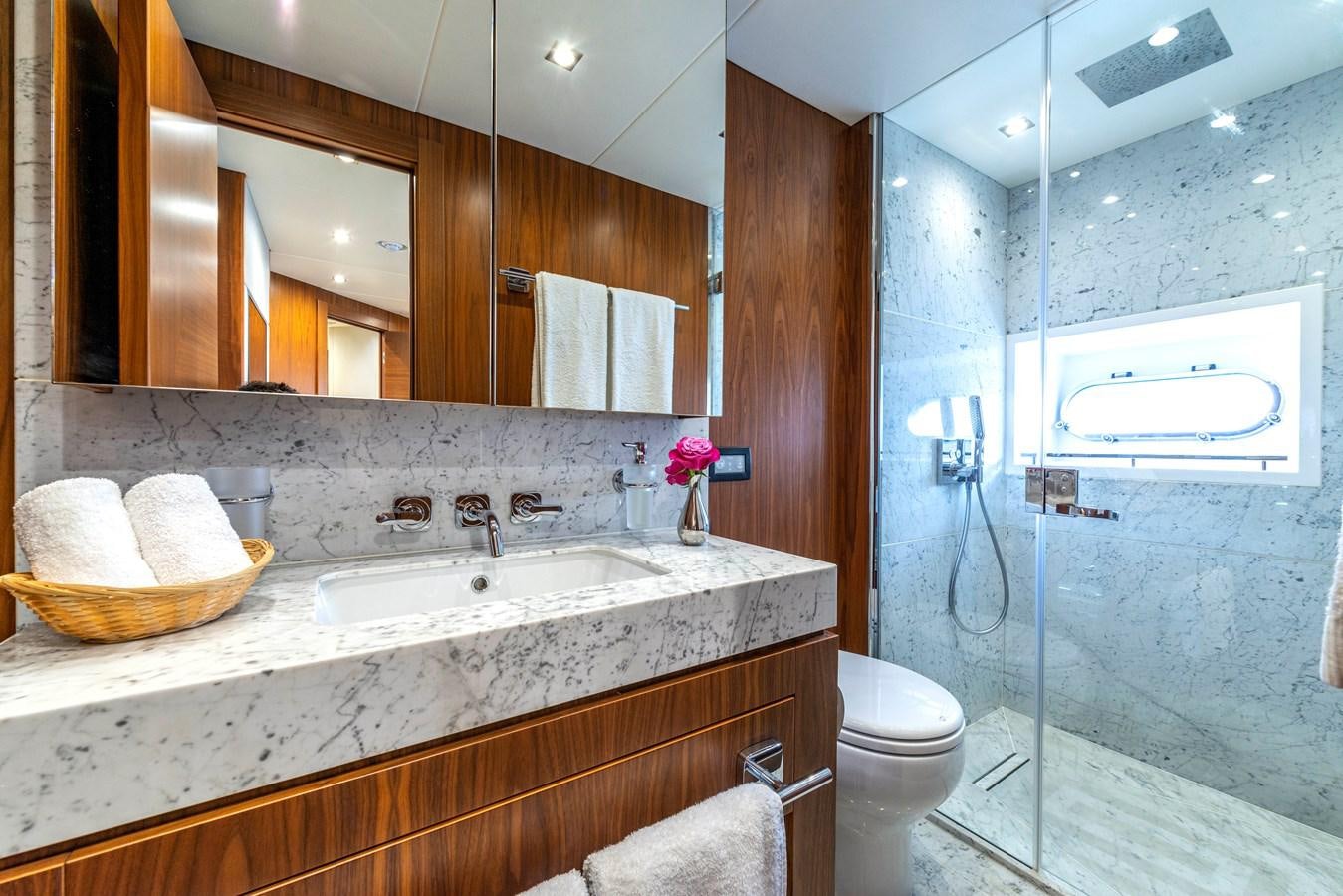 a bathroom with a sink and a toilet aboard TAKE OFF Yacht for Sale
