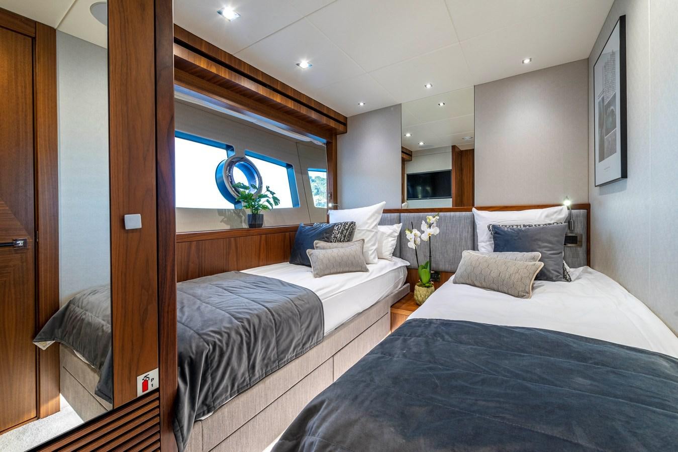 a room with two beds aboard TAKE OFF Yacht for Sale