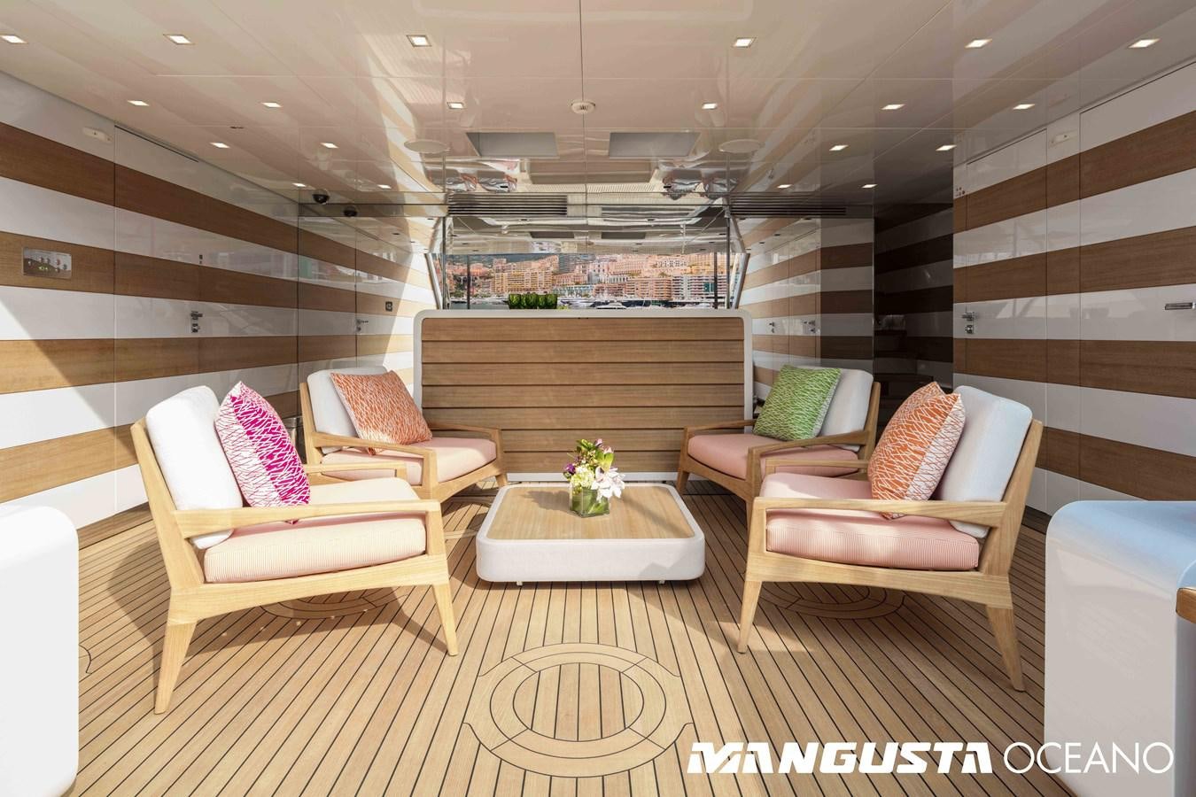 a room with couches and a table aboard SANCTUARY Yacht for Sale