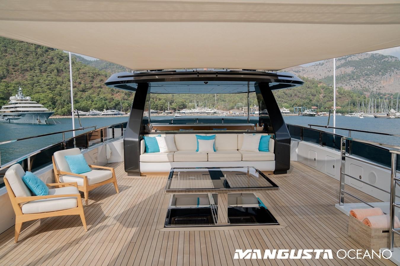 a deck with a pool and a view of a city aboard SANCTUARY Yacht for Sale