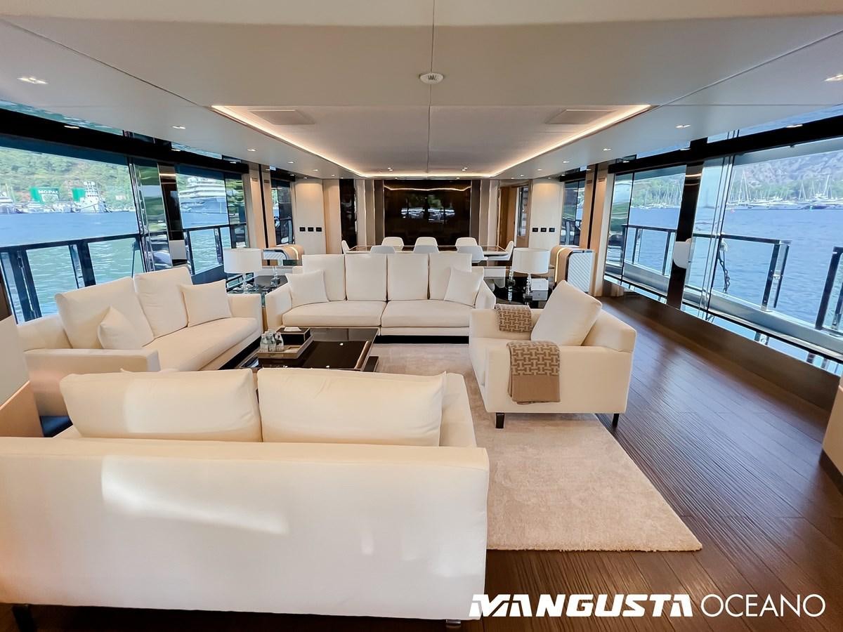 a living room with a large window aboard SANCTUARY Yacht for Sale