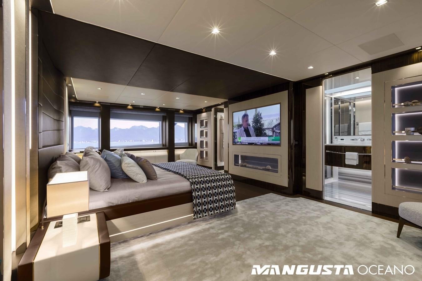 a living room with a large screen aboard SANCTUARY Yacht for Sale