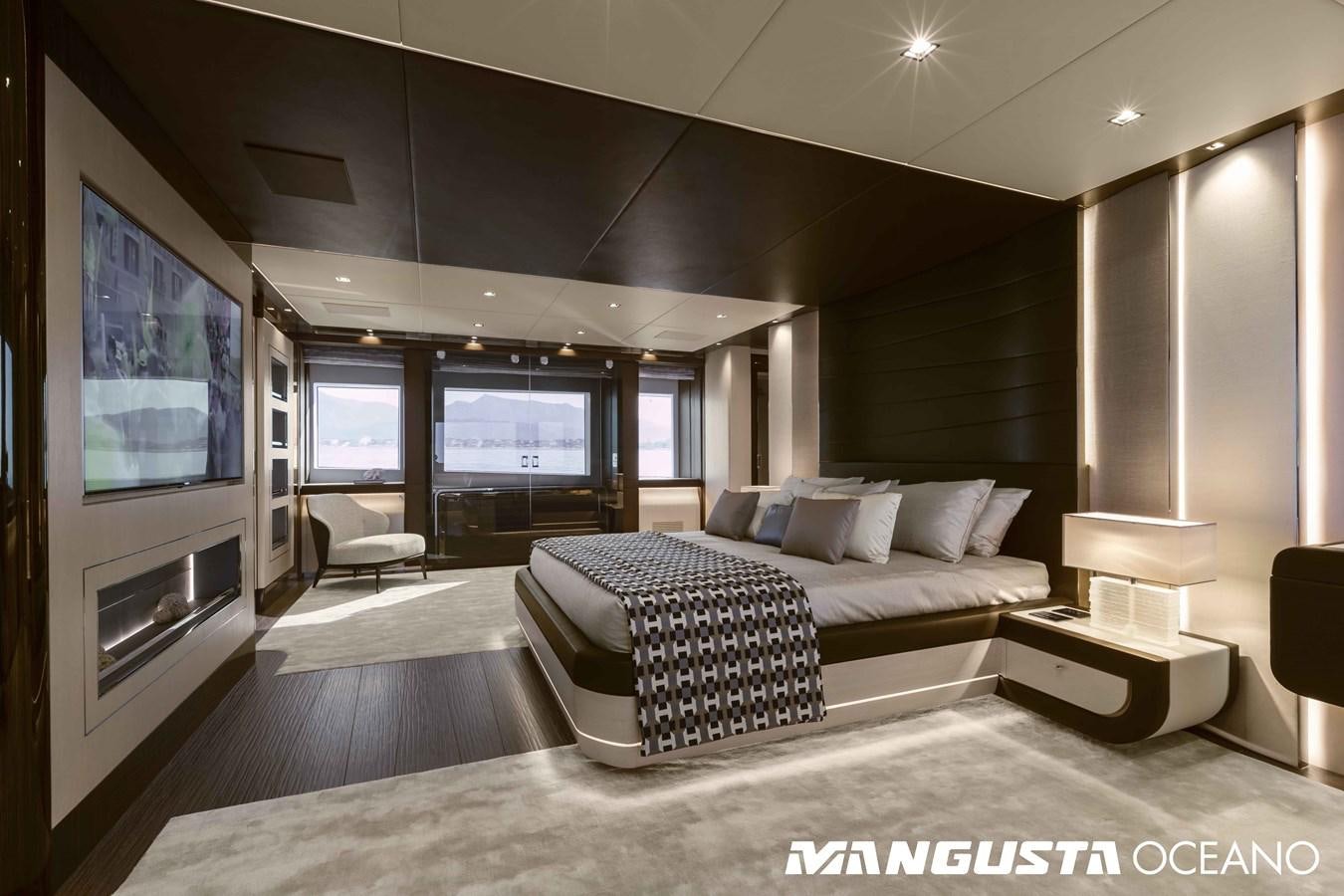 a room with a bed and a tv aboard SANCTUARY Yacht for Sale