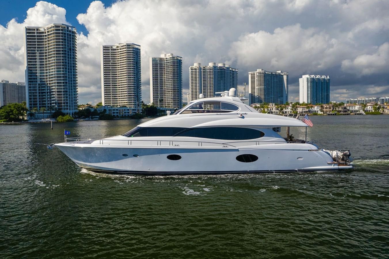 a white yacht in the water aboard CHIP Yacht for Sale