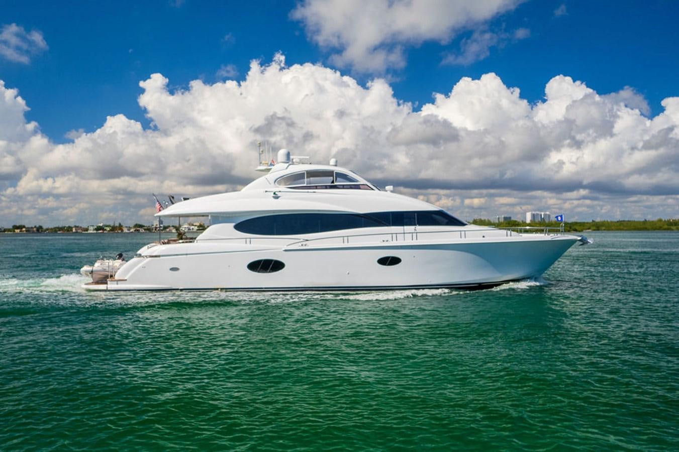 a white yacht in the water aboard CHIP Yacht for Sale
