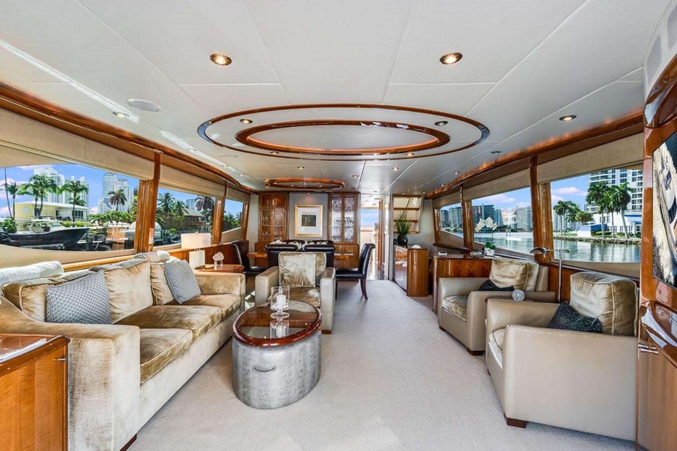 a living room with a large window aboard CHIP Yacht for Sale