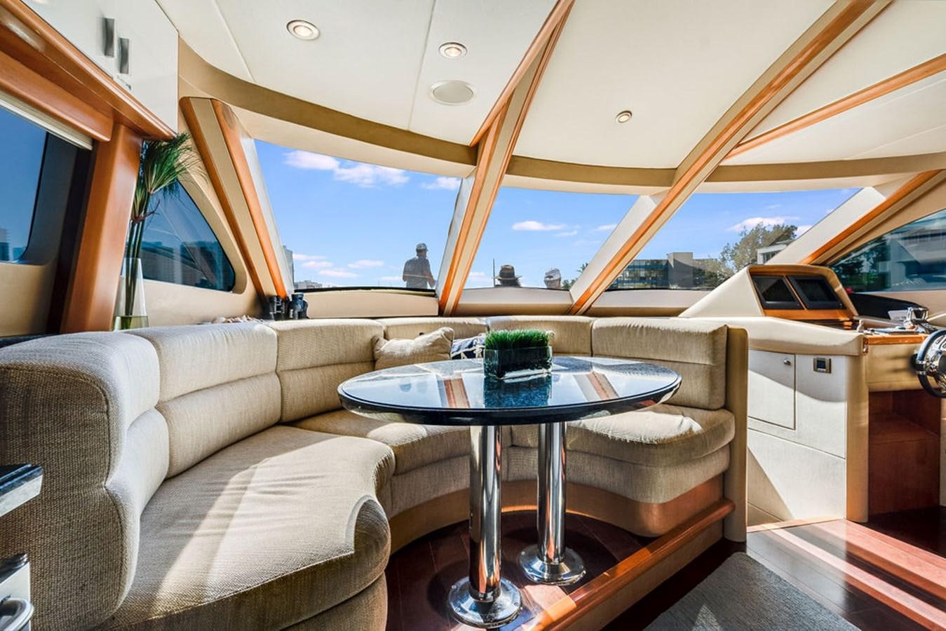 a living room with a large window aboard CHIP Yacht for Sale