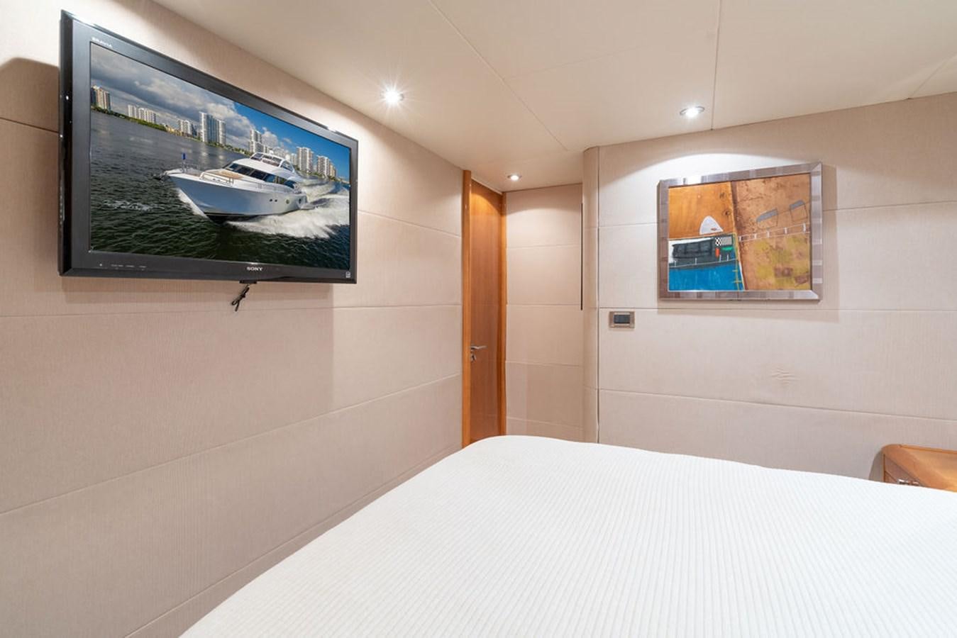 a bed in a room aboard CHIP Yacht for Sale