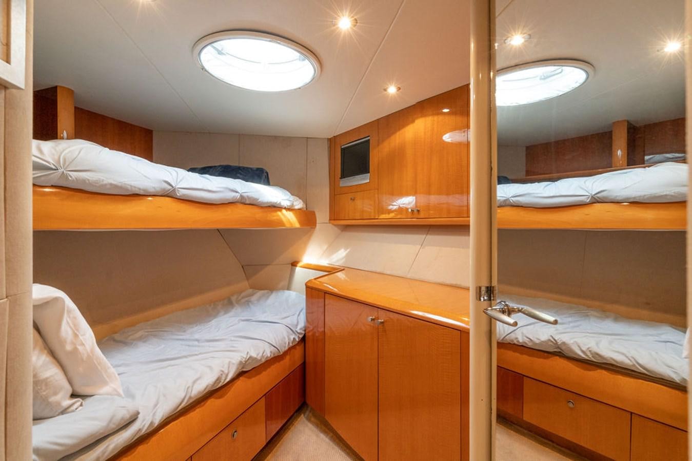 a room with bunk beds aboard CHIP Yacht for Sale