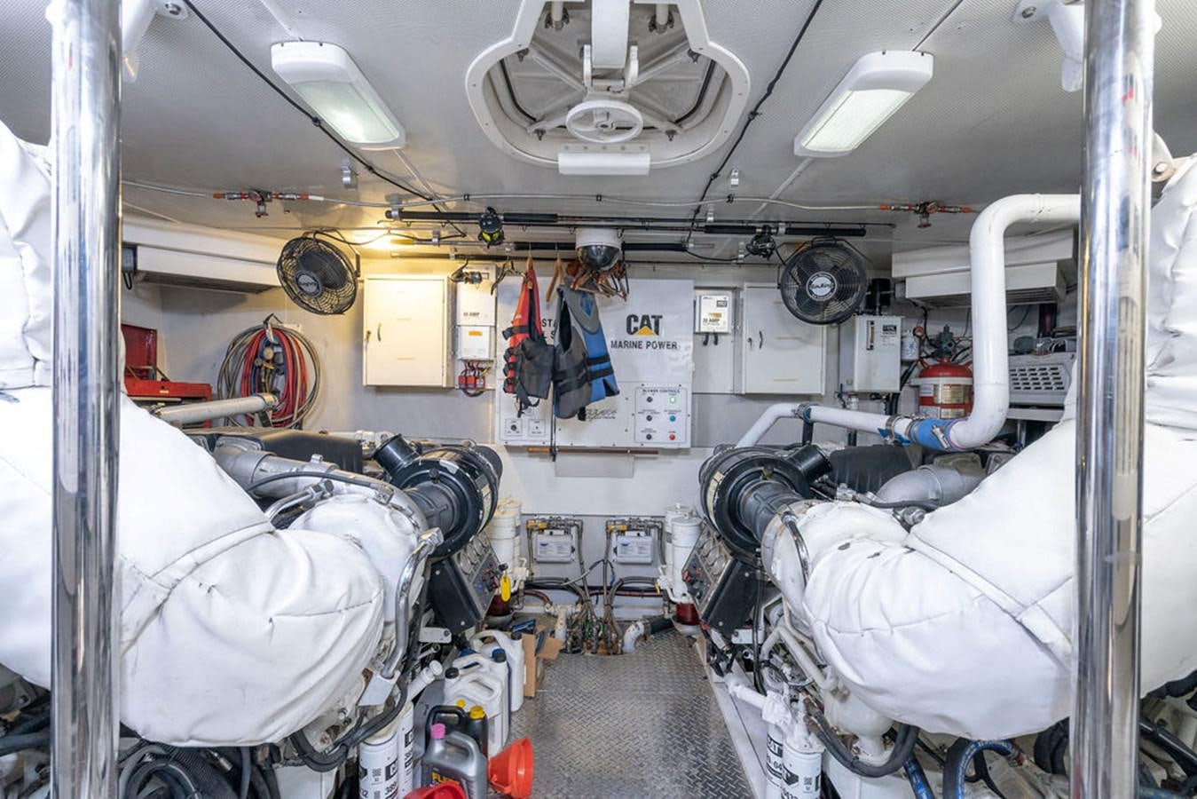 a room with a large white machine aboard CHIP Yacht for Sale