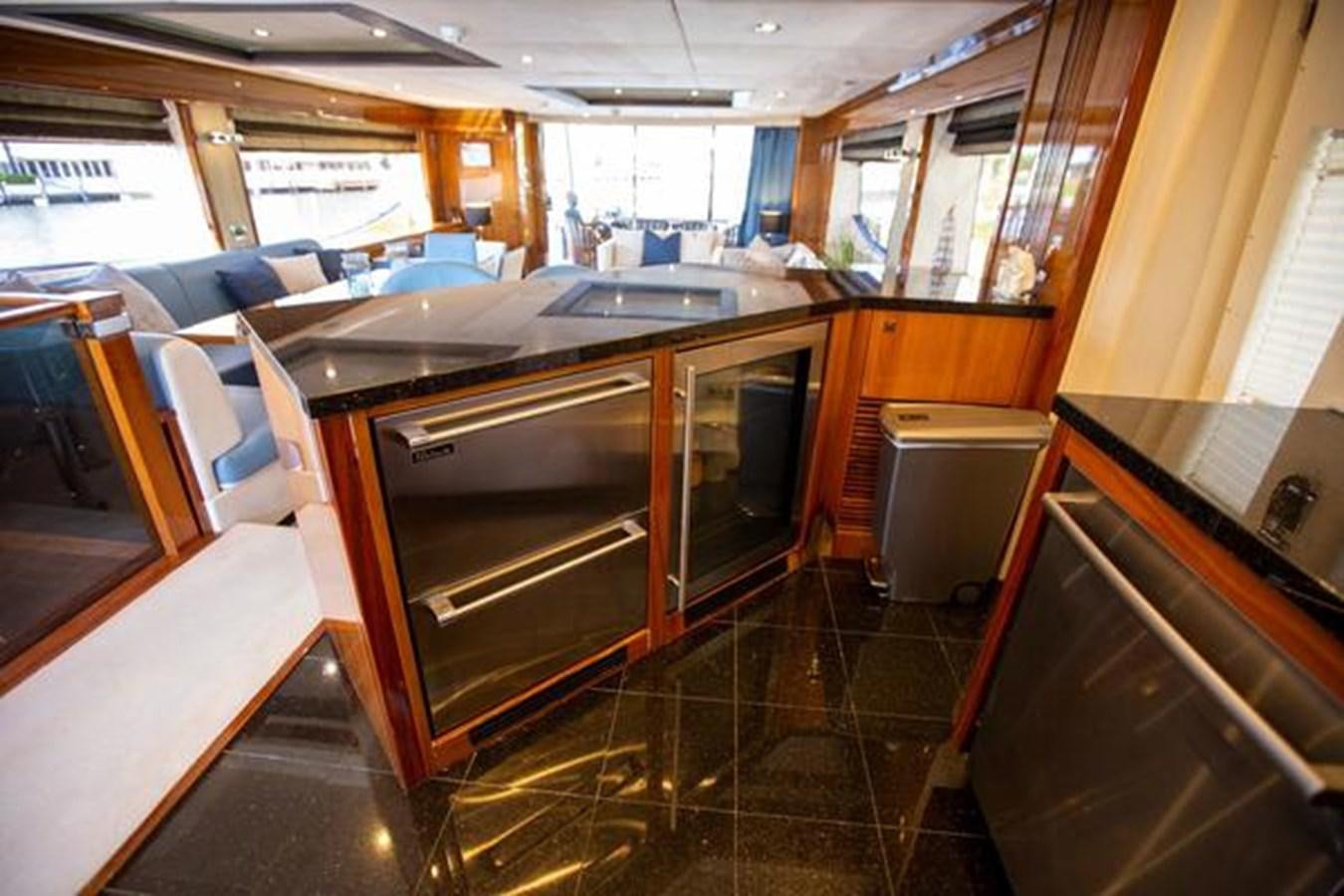 a kitchen with a tile floor aboard THE CABANA Yacht for Sale
